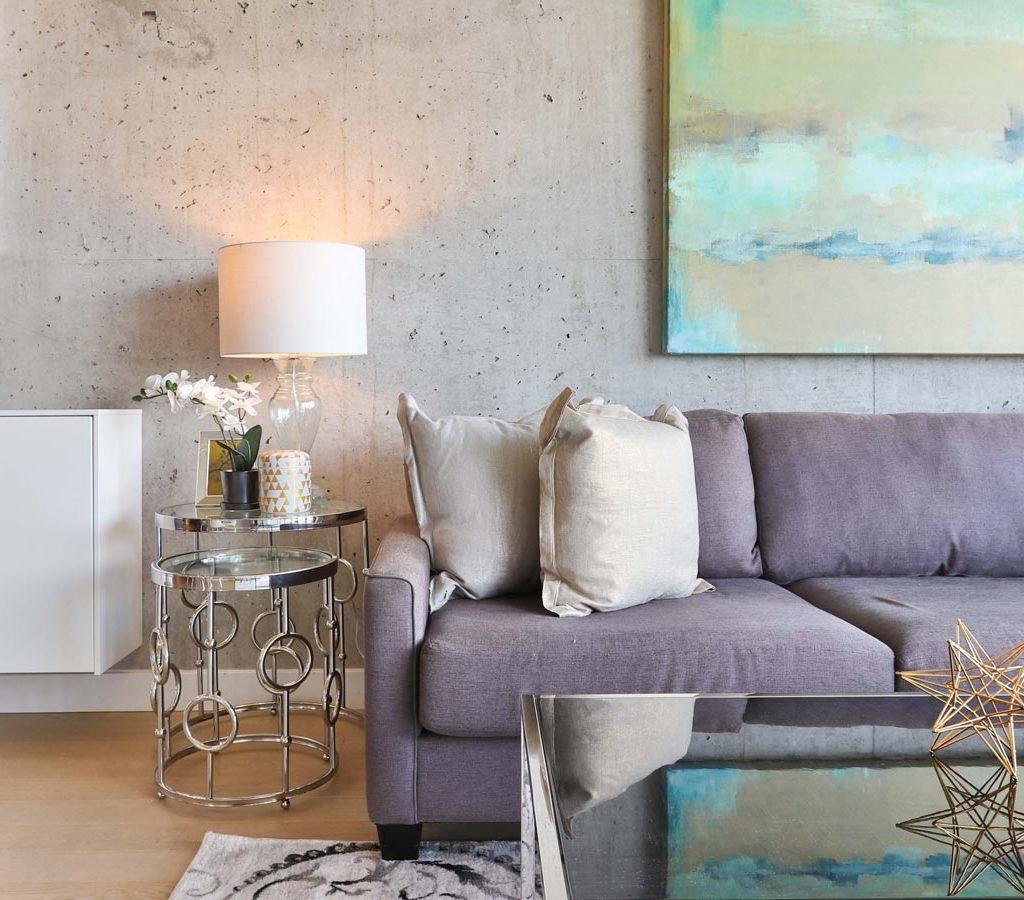 living room couch and side table with lamp