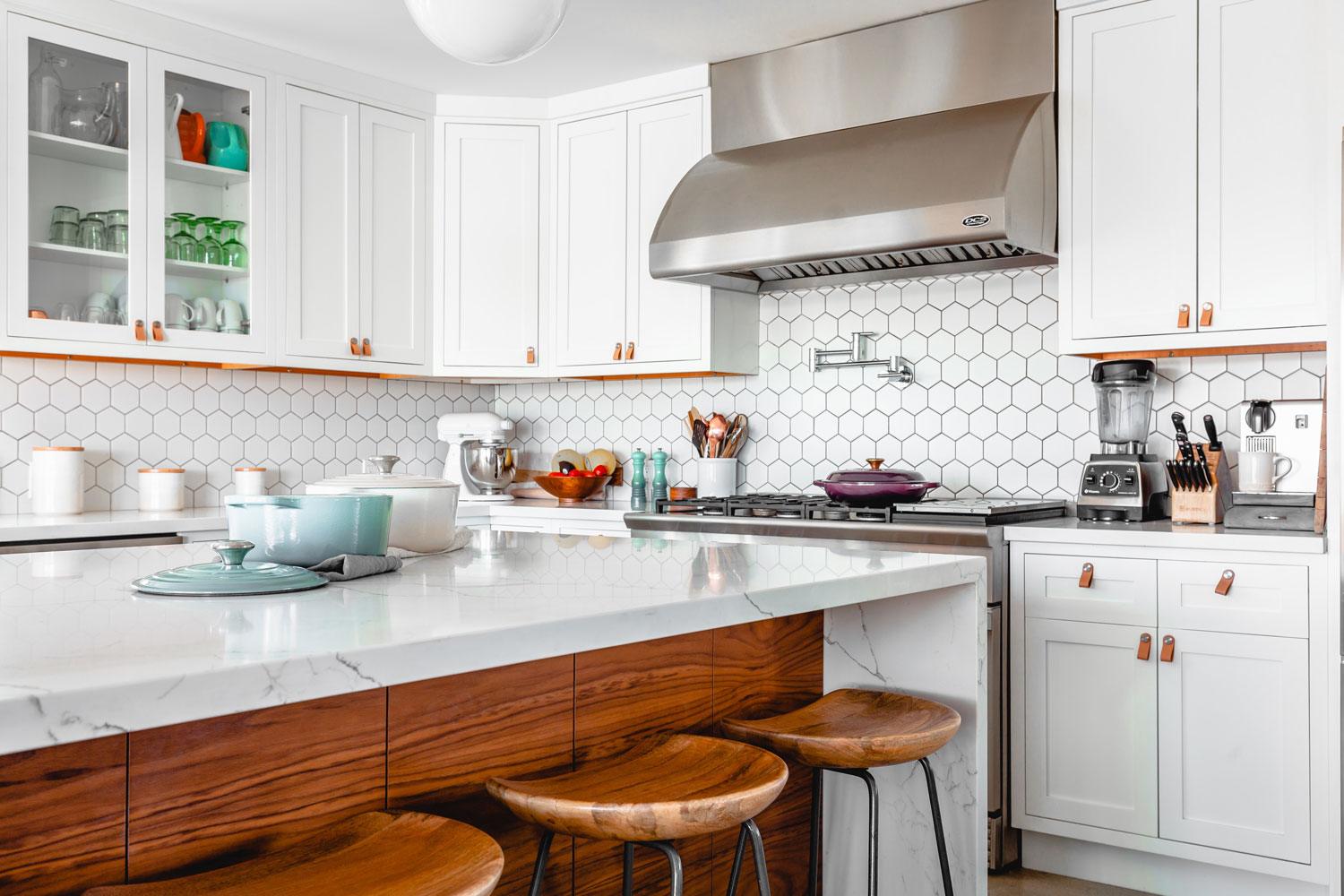 brightly lit kitchen with decorative bowls