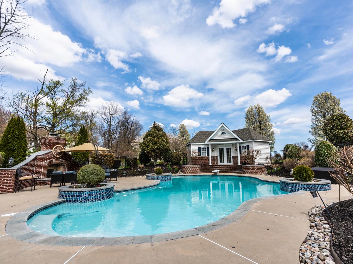 outdoor pool in residential backyard