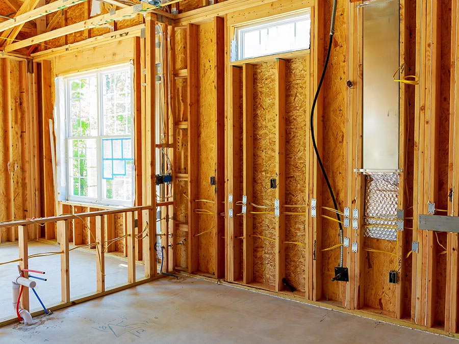 new build of house frame with electrical wiring installed